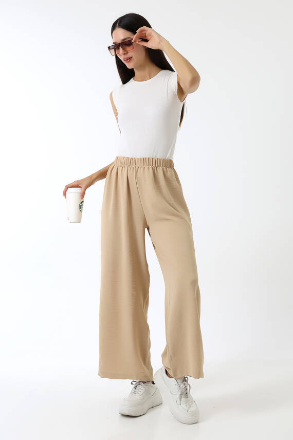 Beli Elastik Geniş Paça Pantolon - Bej - 1